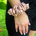 Picture of the Mocha colored scrunchie on the wrist