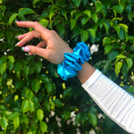 Picture of the Azure, Ocean Blue scrunchie on the wrist