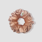 This is a picture of our light brown satin scrunchie named Java. It is a nice earth tone, light brown color resembling a mix of coffee and creamy. The elastic is 8 to 9 inches around. Fun Fact: Java is a slang term for coffee.