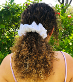 Picture of the White scrunchie in the hair