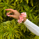Picture of the Powder Pink scrunchie on the wrist