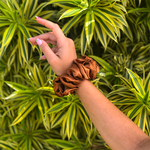 Picture of the Golden Brown scrunchie on the wrist
