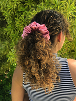 Picture of the Rose colored scrunchie in the hair